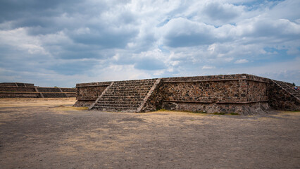 Fototapeta na wymiar Perspective view at the Citadel a large plaza at Teotihuacán, an archaeological complex in Central Mexico. Ancient city of Teotihuacan contains residences, great plazas, temples, and palaces of nobles