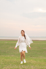Fototapeta na wymiar Happy young Asian women in bride clothing with veil