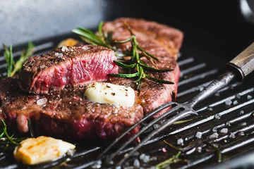 Foto op Canvas beef steak with rosemary © CHZU