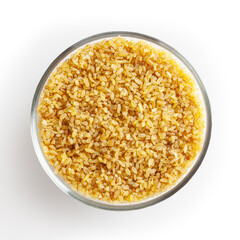 Dried bulghur in glass bowl isolated on white background with clipping path