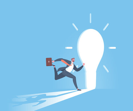 The doorway to success, key to success, business goals, target achievement, successful career or victory concept. Businessman is running toward to the light bulb shaped doorway in blue background.