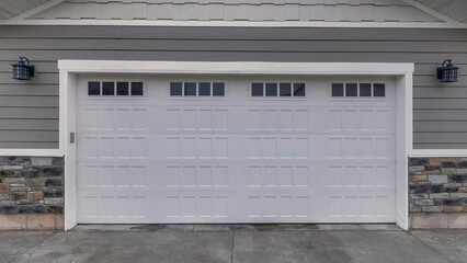 Panorama Whispy white clouds Traditional garage exterior with white and gray tone color palet