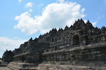 Fototapeta na wymiar The impressive structure of the Borobudur Buddhist temple continues to amaze visitors for centuries 