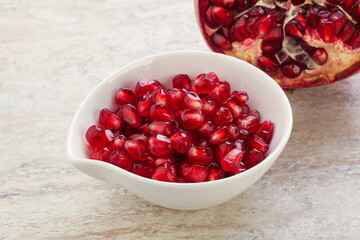 Ripe red Pomegranate seeds in the bowl