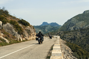 Obraz premium Motorcycling through the mountains