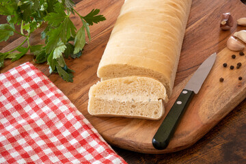 topped bread on a wooden board