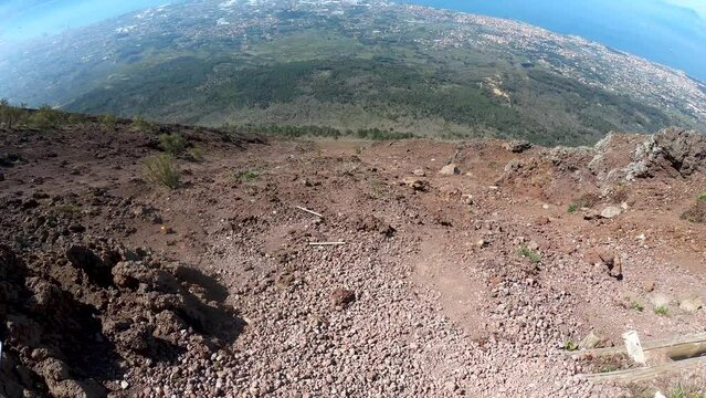 a panoramic view of mount vesuvius to the golf of naples.