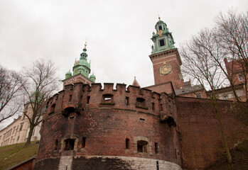 Cathedral royal castle on the Wawel Hill, Krakow, Poland on foggy afternoon