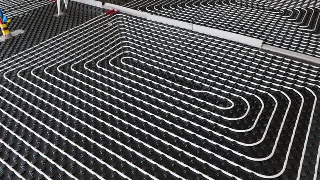 Zoom in shot of underfloor heating system. High angle