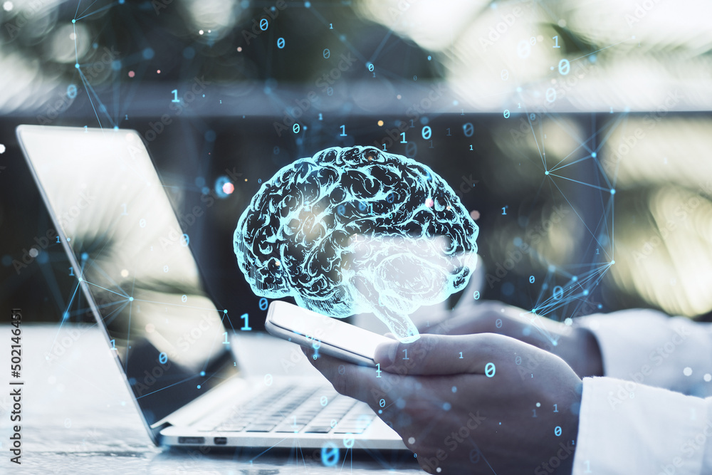 Poster close up of businessman hands using laptop and smartphone with creative polygonal brain hologram on 