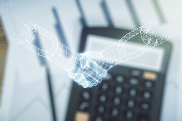 Abstract virtual blockchain technology hologram with handshake on calculator background. Digital...
