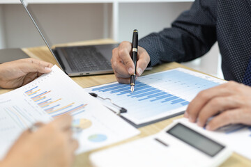 Brainstorm team, Marketers and financial accountants are discussing and analyzing charts to plan a company's growth and development strategy, Team meetings or business consulting, Business profit.