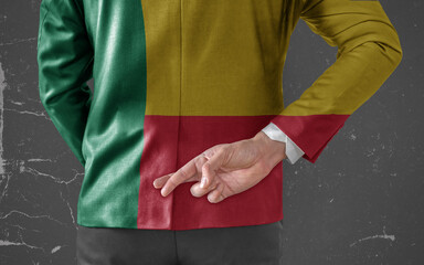 Jacket Flag of Benin on Businessman with his fingers crossed behind his back