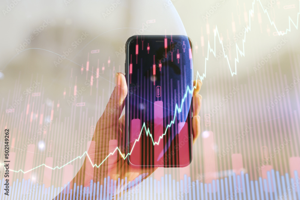 Poster multi exposure of abstract financial graph with world map and hand with mobile phone on background, 