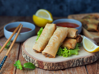 Spring rolls, Egg rolls filled with vegetables serve with sweet and sour dipping sauce.