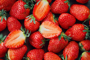Fresh strawberries, top view of ripe berries. Background of ripe strawberries, delicious natural dessert