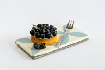 cake with fresh berries, blueberries on a stand. Natural Ingredients