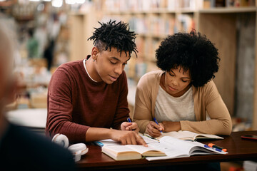 African American students learn for their exams at university library