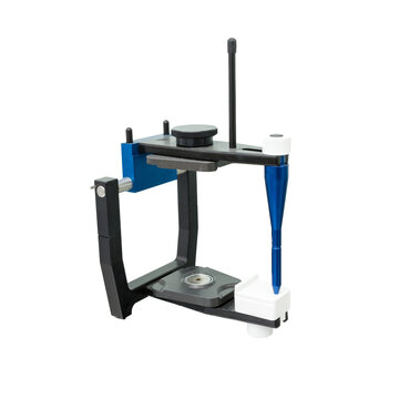 An articulator used in dental laboratories clipped on white background