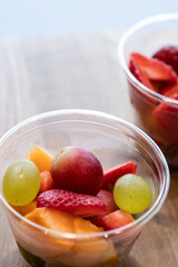 Two fresh fruit salads