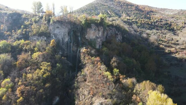 Aerial Autumn view of Polska Skakavitsa waterfall at Zemen Mountain, Kyustendil Region, Bulgaria