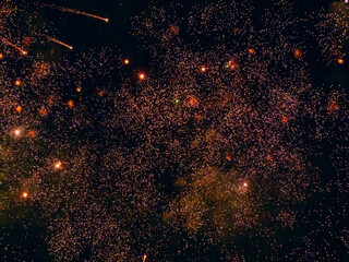 Bright Splashes of Festive Firework Lights Lit Up the Black Night Sky