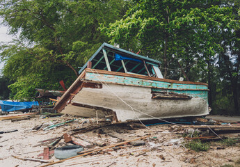 Old thai wooden boat on the beach
