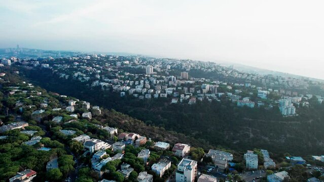 Drone shot of hills and valleys in haifa city israel