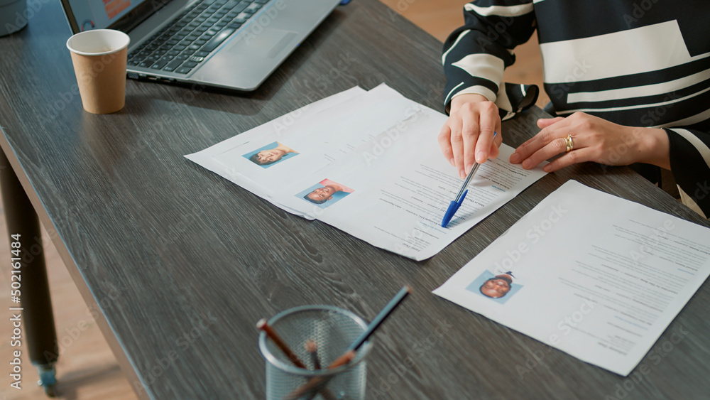 Aufkleber office worker analyzing candidates cv and application form before attending job interview and hiring