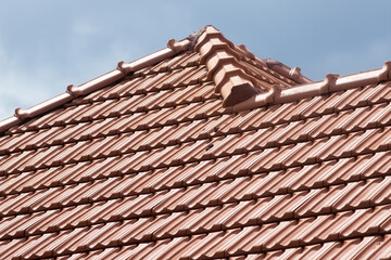 new red tiles roof and blue sky