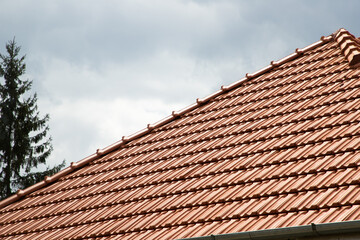 new red tiles roof and blue sky