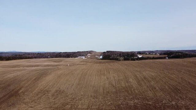 fields filmed by a drone at the end of winter