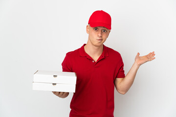 Pizza delivery man with work uniform picking up pizza boxes isolated on white background having...