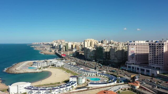 Aerial drone shot of Alexandria Corniche, Cars and Beach (Alexandria, Egypt)