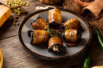 Georgian eggplant appetizer badrijani portion on the table
