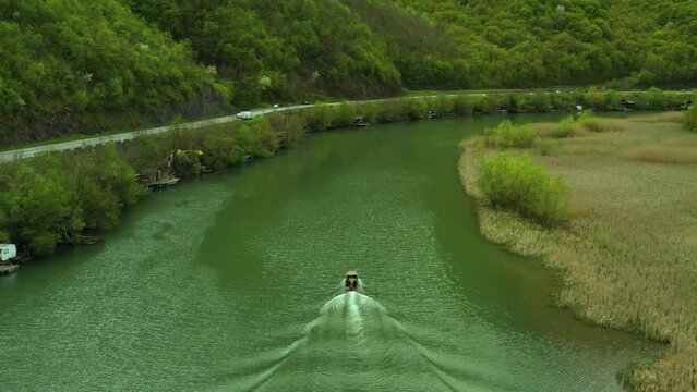 Boat Cruising on Zapadna Morava River in Ovcar Kablar Canyon, next to city of Cacak, Serbia