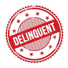 DELINQUENT text written on red grungy round stamp.