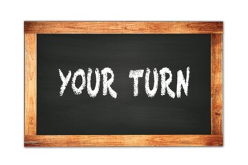 Fototapeta premium YOUR TURN text written on wooden frame school blackboard.