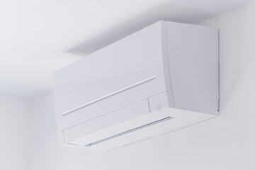 Air conditioner internal unit mounted on living room wall indoors