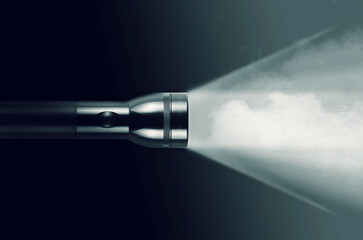 Metal black flashlight, search in the dark concept, spooky atmosphere, product photo, focus idea