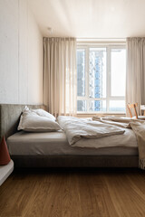 bedroom in white and beige tones, bedroom interior in loft style