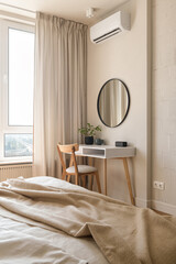 bedroom in white and beige tones, dressing table in the bedroom, bedroom interior in loft style