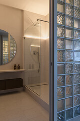 modern loft style bathroom with shower, bathroom with glass blocks