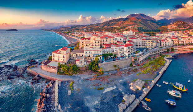Perfect summer view from flying drone of Diamante port, Province of Cosenza. Colorful evening seascape of Mediterranena sea. Great outdoor scene of Italy, Europe. Traveling concept background.