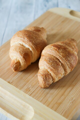 croissant on wooden table