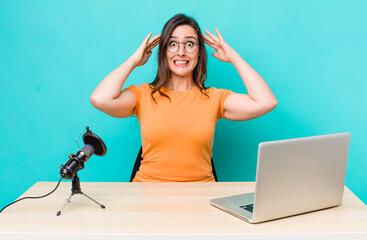 young pretty woman  feeling stressed, anxious or scared, with hands on head. influencer concept
