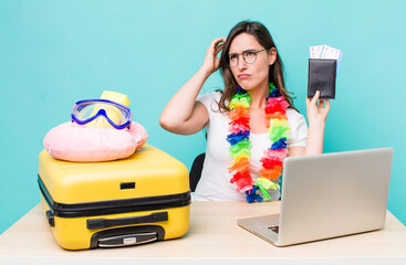 young pretty woman  smiling happily and daydreaming or doubting. summer travel concept