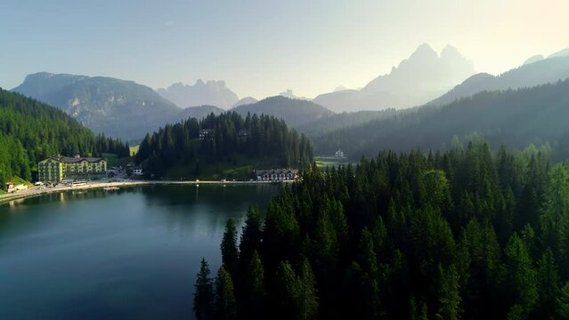 Aerial flight adove stunning Alps. High mountain peaks sharp cliffs Dolomites, Italy