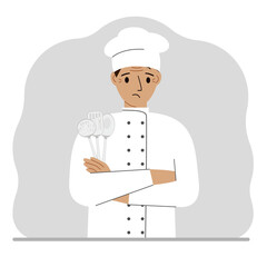 A sad cook holds a kitchen set of cutlery in his hand. Profession.
