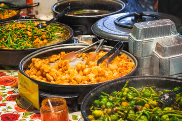 Crispy bang bang chicken and other Chinese stir fry at Brick Lane Market in London